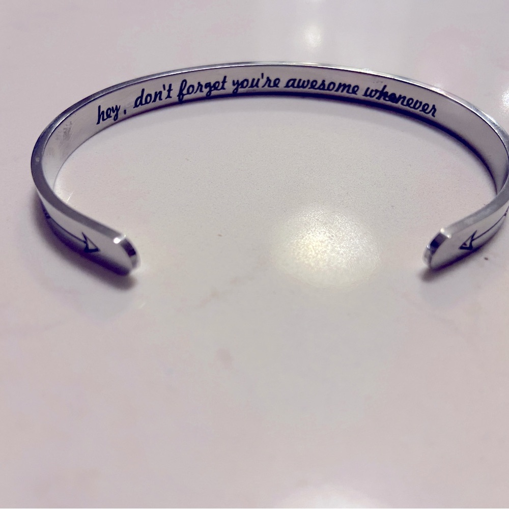 “awesome” silver metal bracelet with blue gift bag